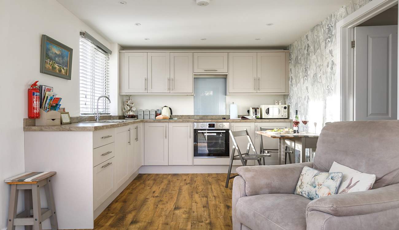 A restful sanctuary to unwind with triple aspect windows allowing the light to flood in yet cosy in winter.