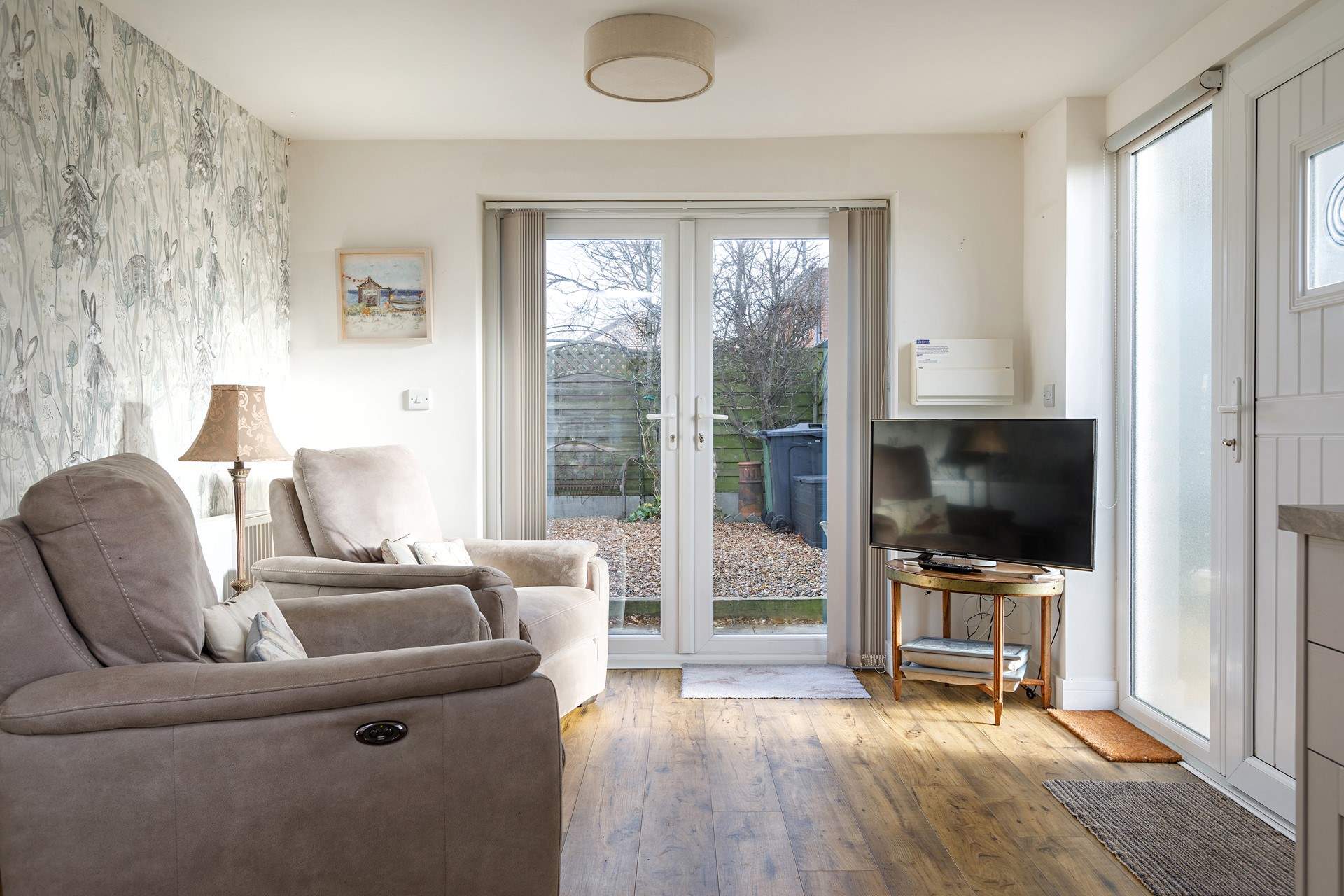 The reclining chairs in the open plan living area add to a relaxing stay.