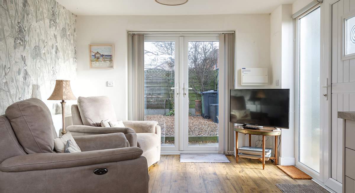 The reclining chairs in the open plan living area add to a relaxing stay.