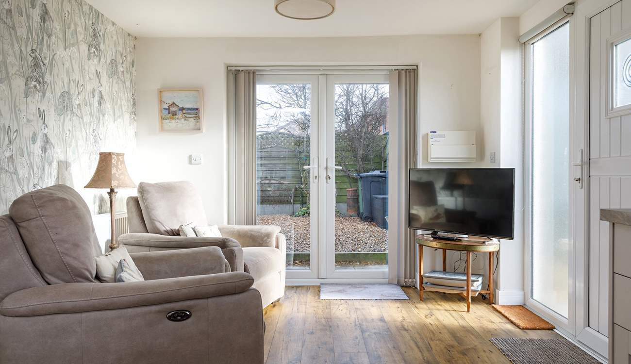 The reclining chairs in the open plan living area add to a relaxing stay.