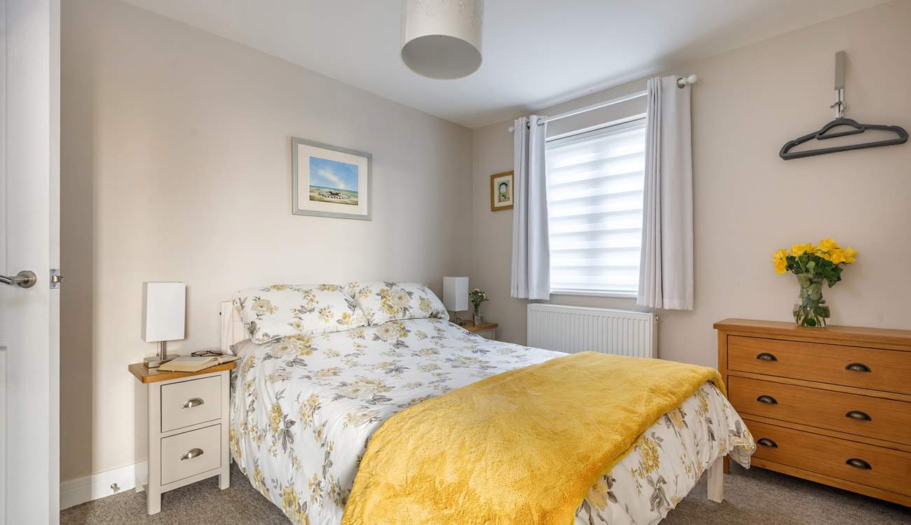 When the time comes to call it a night, you will find a lovely bed for a relaxing night's sleep.