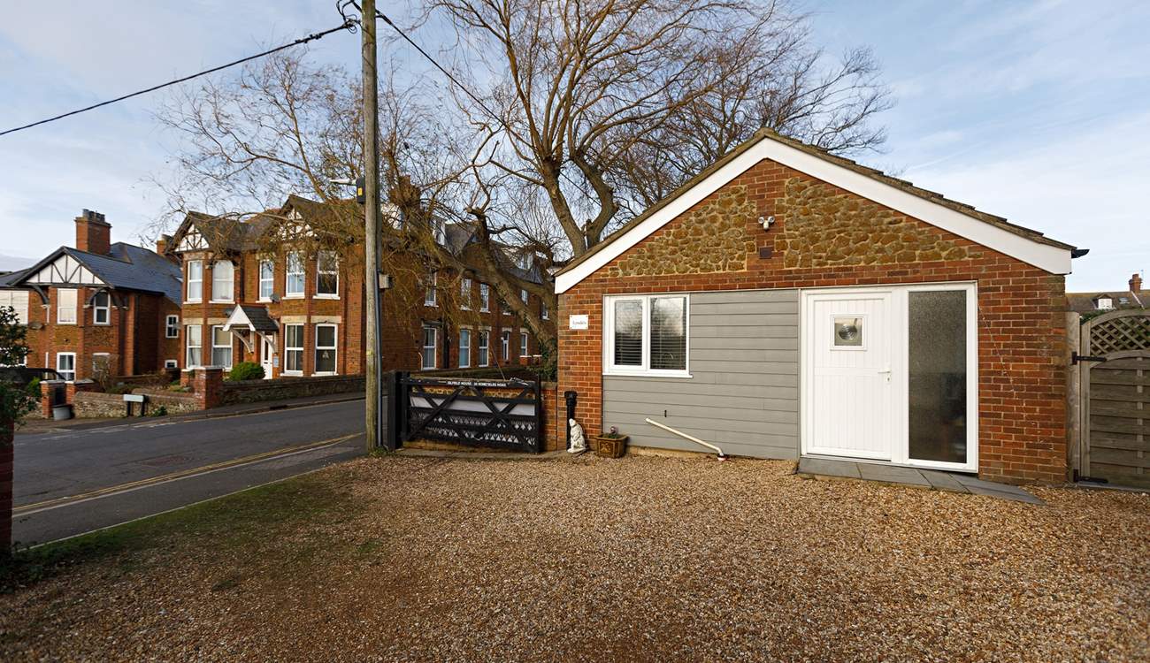 There is off road parking for one car on the stone drive beside the owner's house.