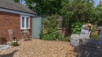 Enjoy the fresh air in the secluded, gravelled garden. 