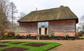 This gorgeous Grade II Listed 17th Century timber thatched barn, has been beautifully renovated and sits in an idyllic countryside setting. - Thumbnail Image