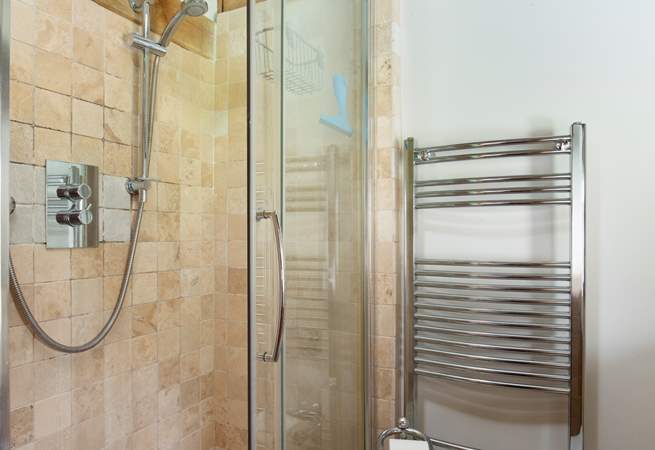 With en suite shower and heated towel rail.