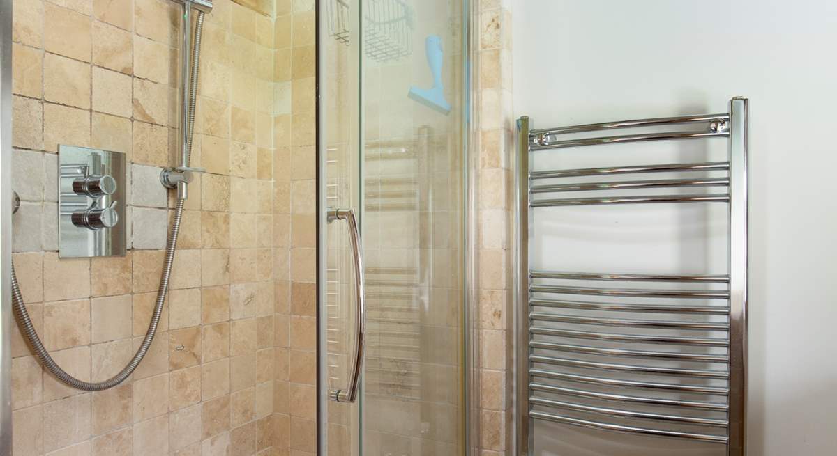 With en suite shower and heated towel rail.