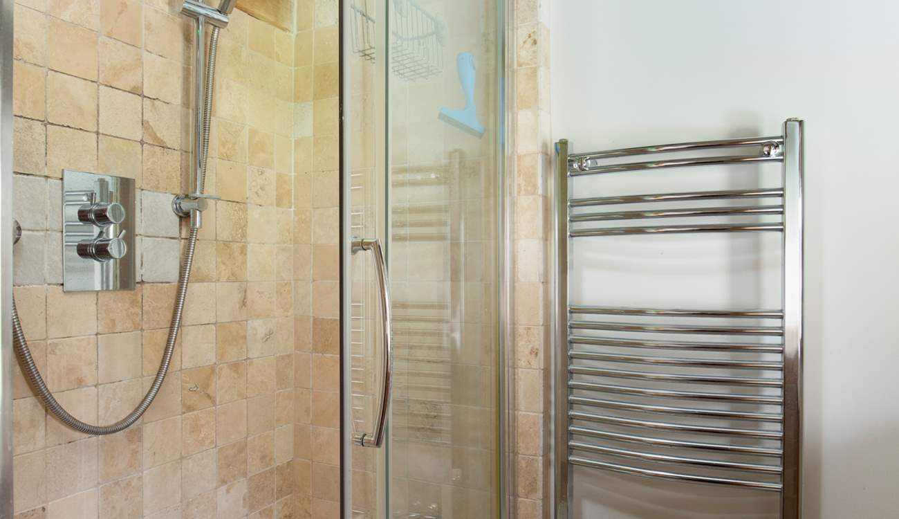 With en suite shower and heated towel rail.