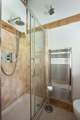 With en suite shower and heated towel rail.