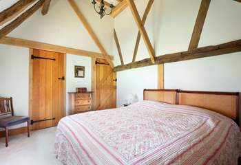 Bedroom 1 in the west wing is a comfortable haven.
