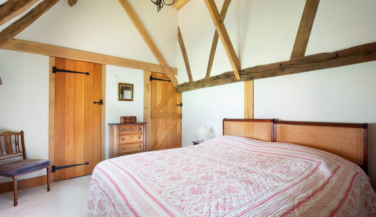 Bedroom 1 in the west wing is a comfortable haven.