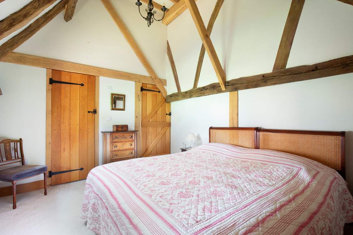 Bedroom 1 in the west wing is a comfortable haven.