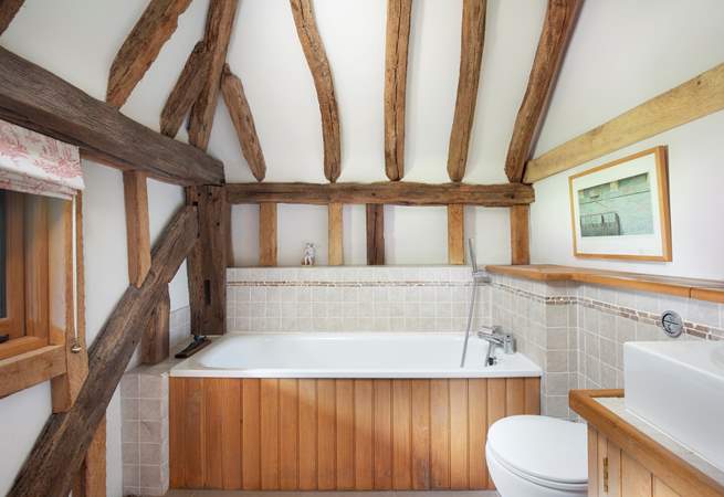 Enjoy a bedtime soak in the en suite bathroom.