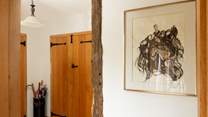 Entrance hall with space for boots and brollies.