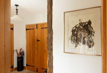 Entrance hall with space for boots and brollies.