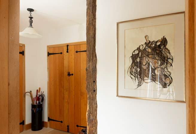 Entrance hall with space for boots and brollies.