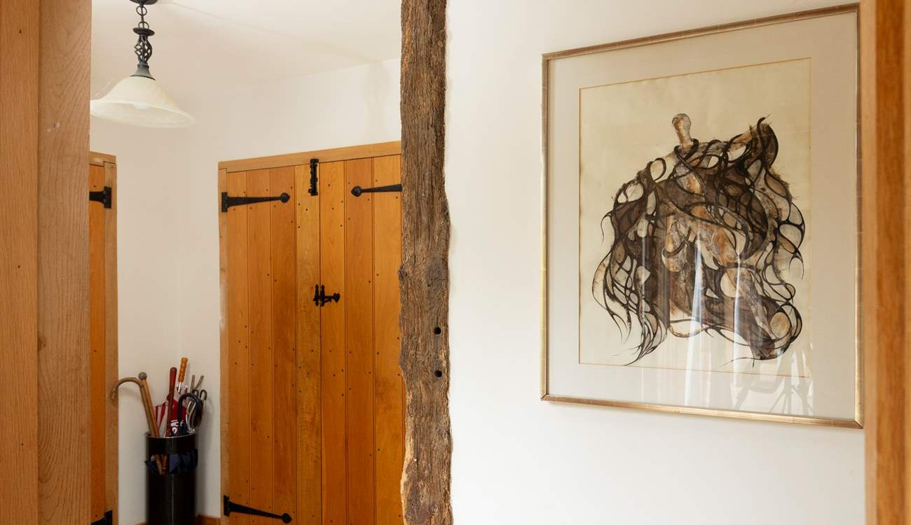 Entrance hall with space for boots and brollies.