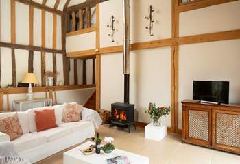 Get cosy in front of the wood-burner, relax and watch movies together.