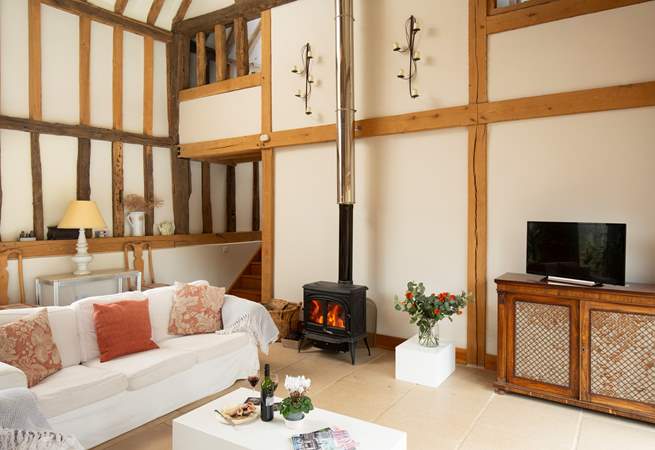 Get cosy in front of the wood-burner, relax and watch movies together.