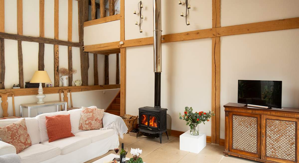 Get cosy in front of the wood-burner, relax and watch movies together.