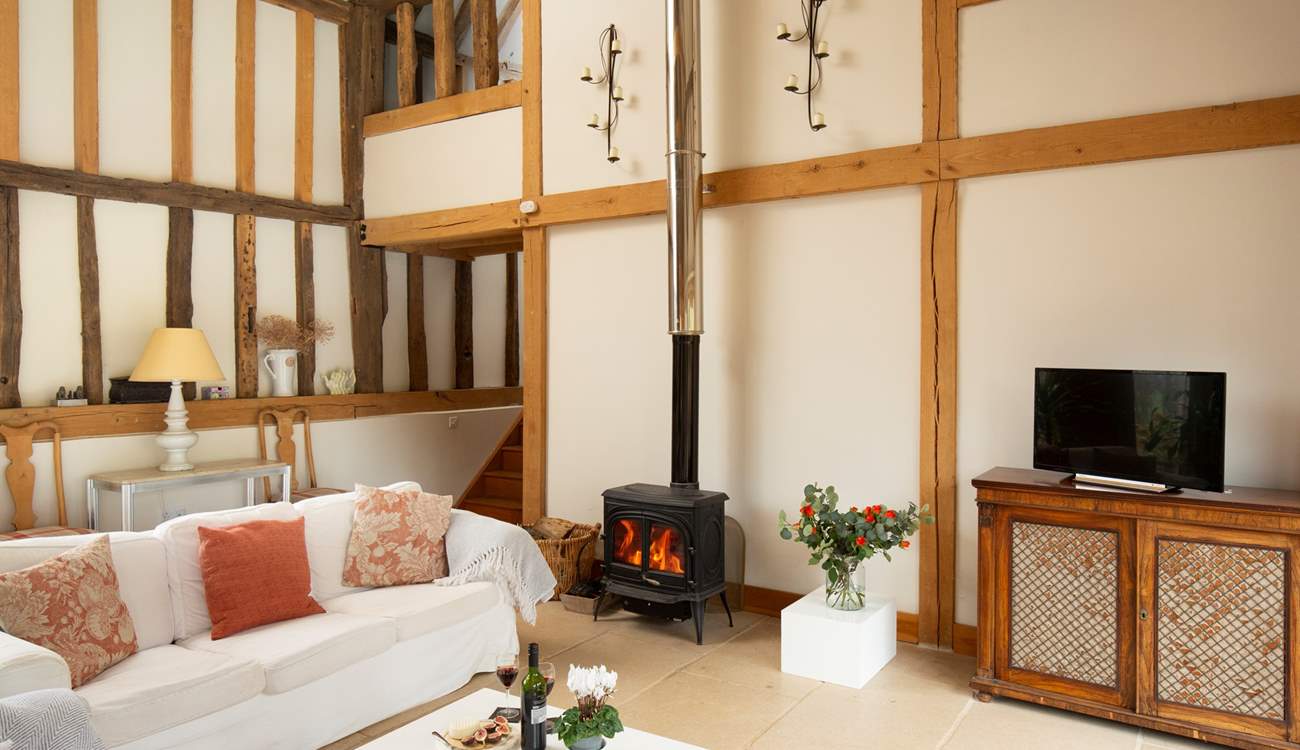 Get cosy in front of the wood-burner, relax and watch movies together.