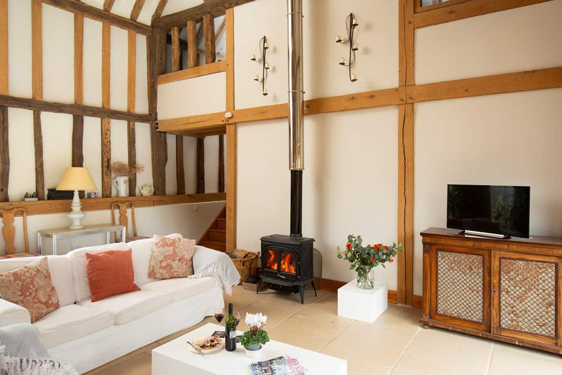 Get cosy in front of the wood-burner, relax and watch movies together.