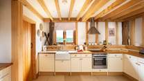 Plenty of room in this beautifully equipped country-style kitchen.