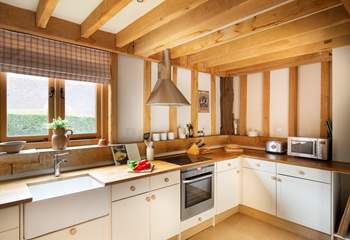 The country-style kitchen has all you need to rustle up a culinary feast. 
