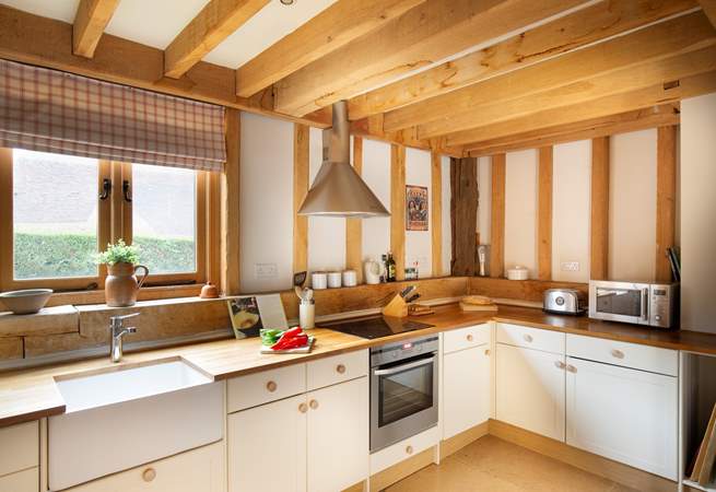 The country-style kitchen has all you need to rustle up a culinary feast. 