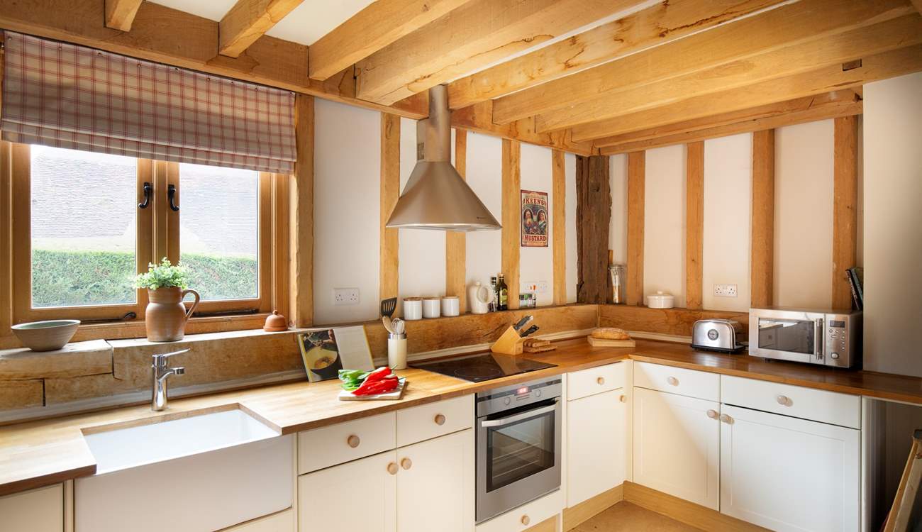 The country-style kitchen has all you need to rustle up a culinary feast. 