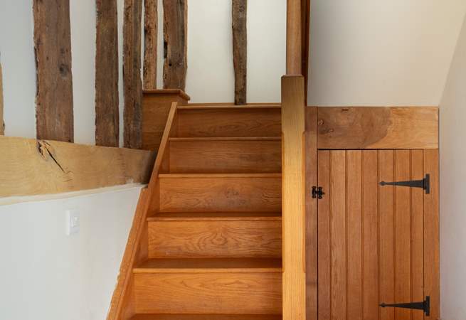 Stairs lead to the east wing and landing, lead to bedroom 2.