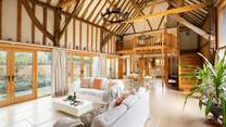 A spacious holiday barn with characterful beams add to its charm.  