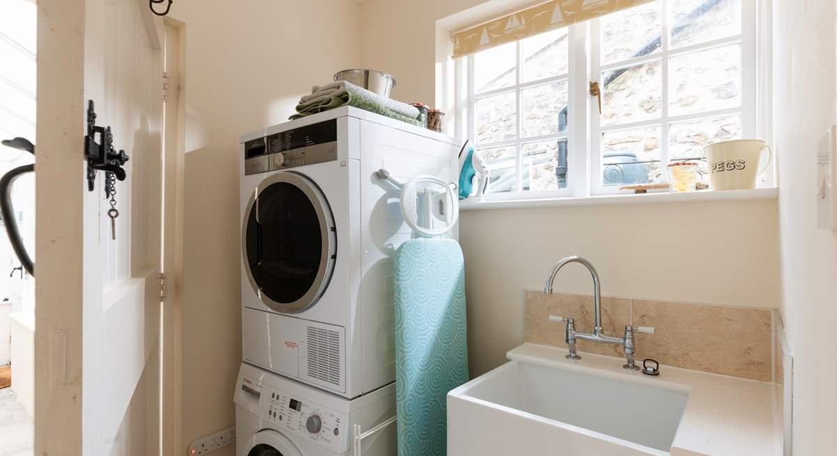 There is a handy utility-room, ideal for cleaning muddy paws.