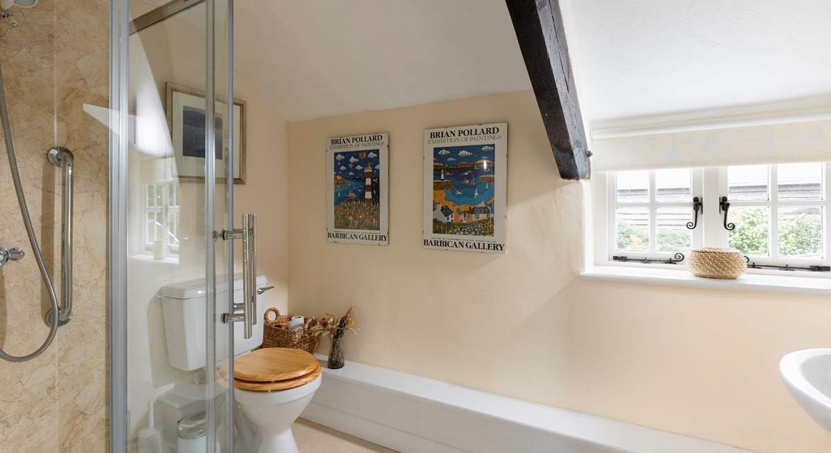 The upstairs shower-room lies between the two bedrooms.