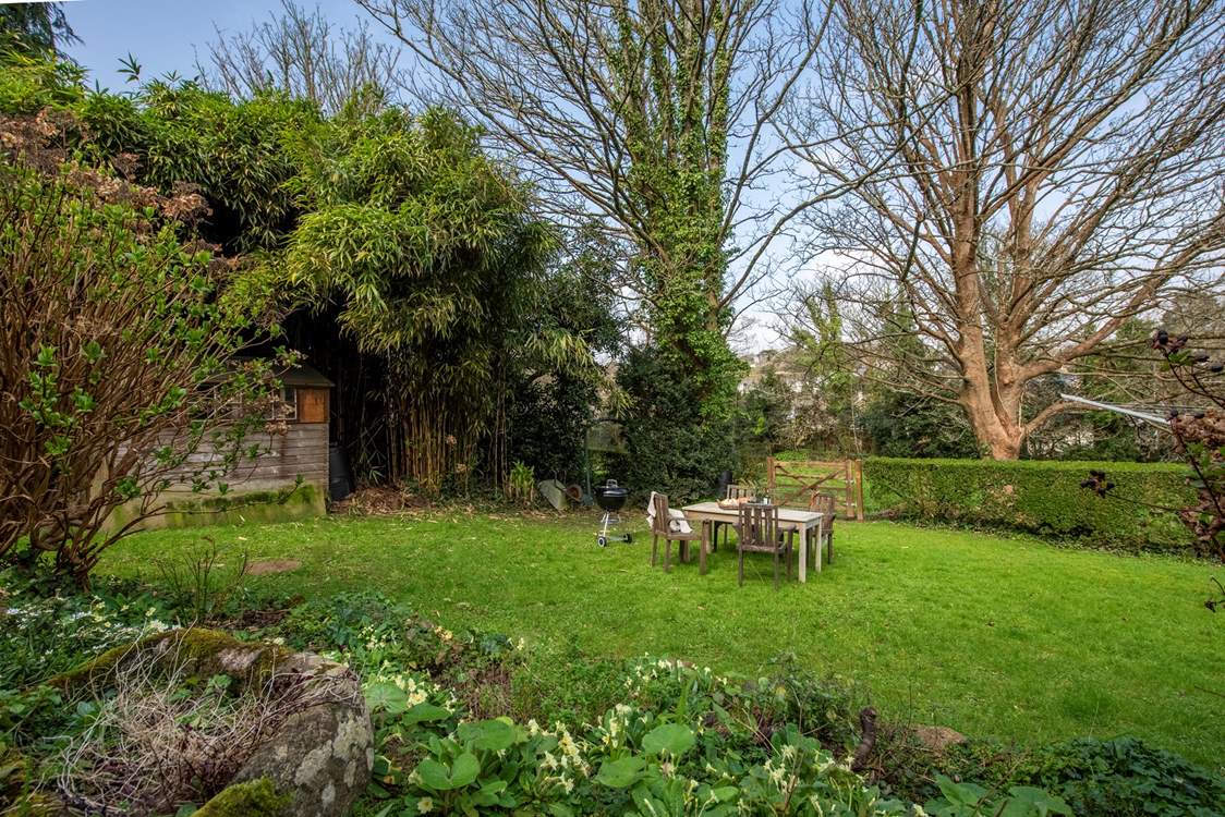 The mature enclosed garden with a meadow beyond is bordered by a stream which can be heard from the house. The meadow is solely left for local wildlife to make their home.