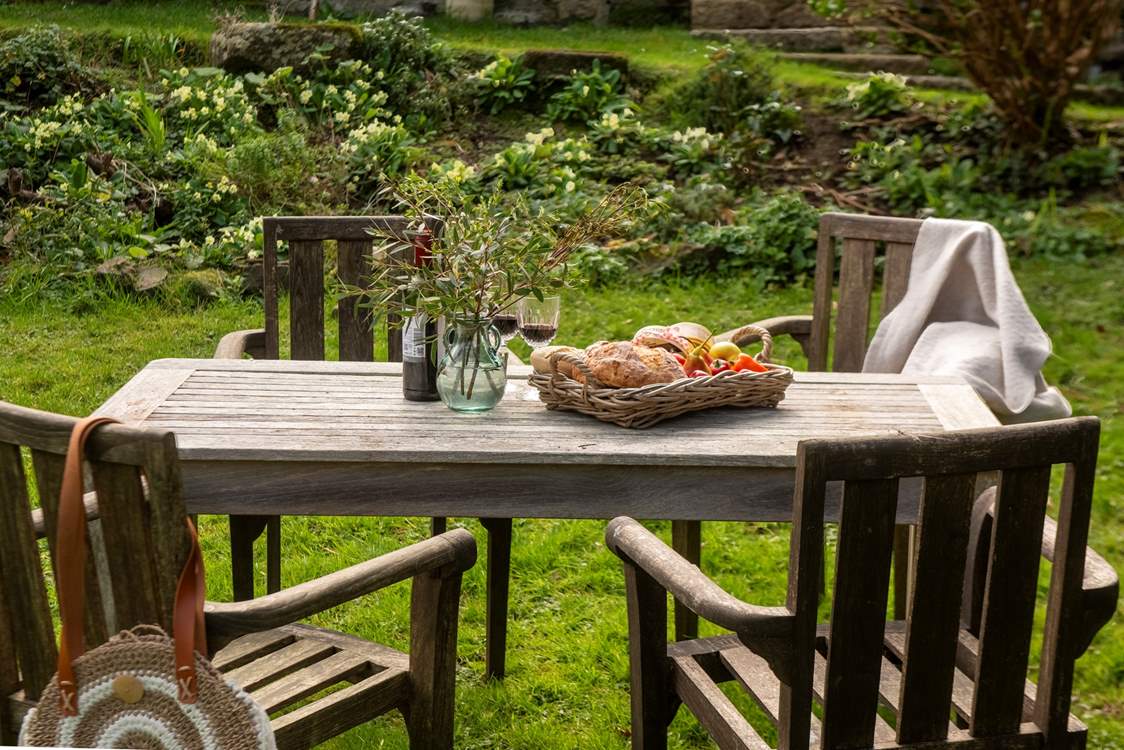 Enjoy lunch al fresco in the beautiful mature garden.