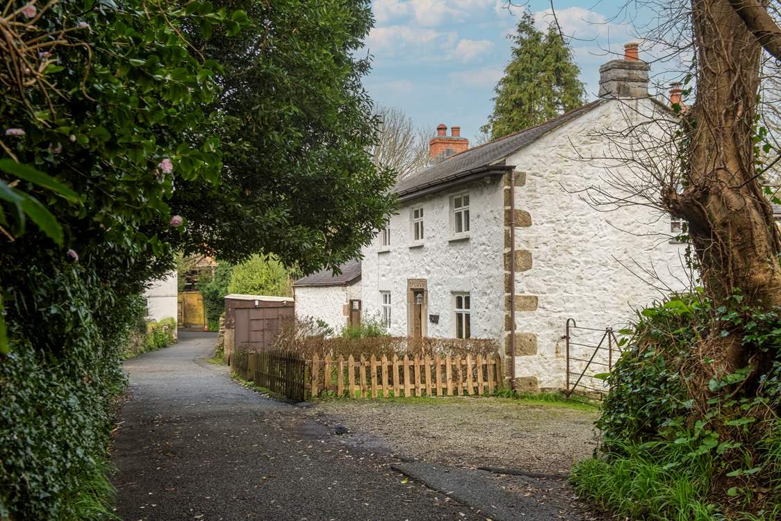 Parking for Love Lane Cottage is next to the house.