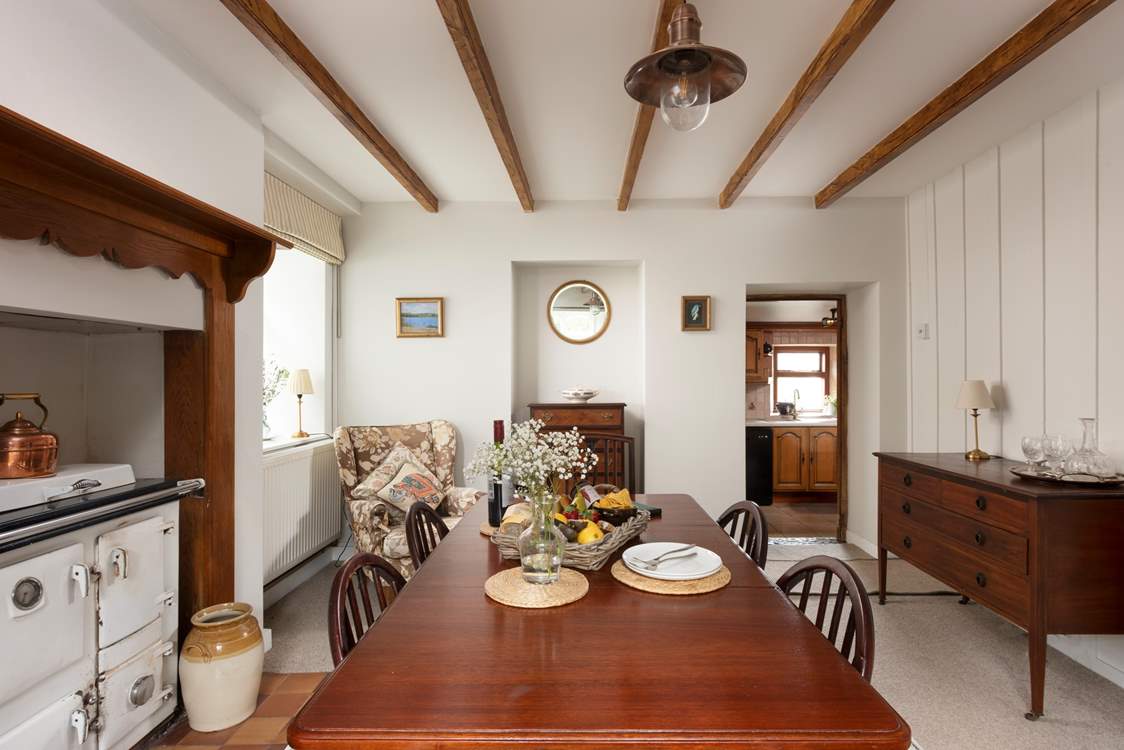 Looking from the dining-area, step down into the kitchen.