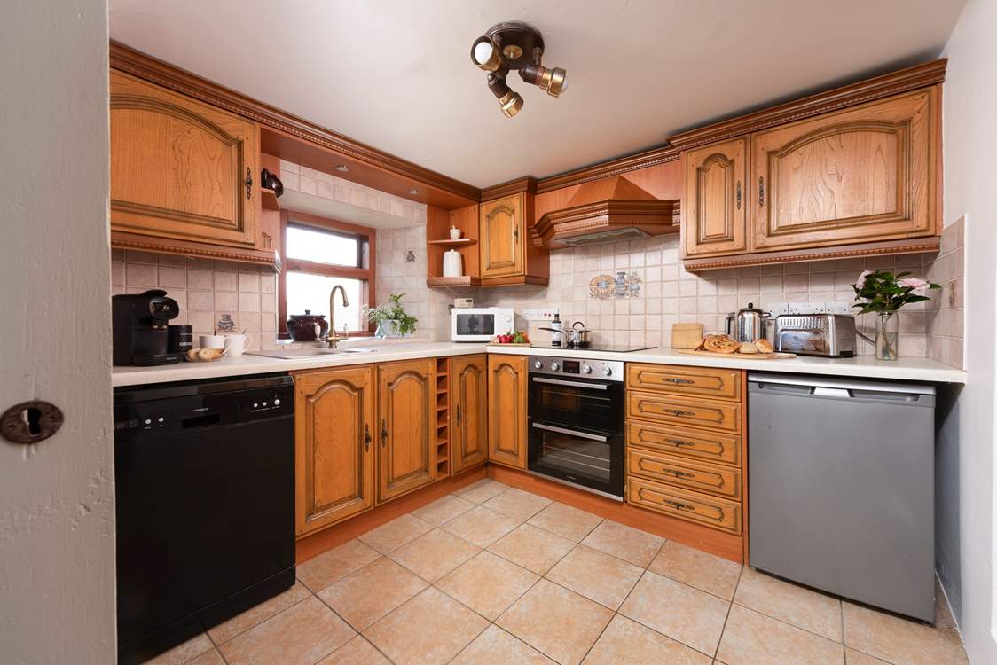 A kitchen in keeping with this historic property yet fully equipped with modern appliances.