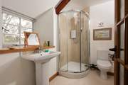 A very modern shower-room completes this delightful little home.