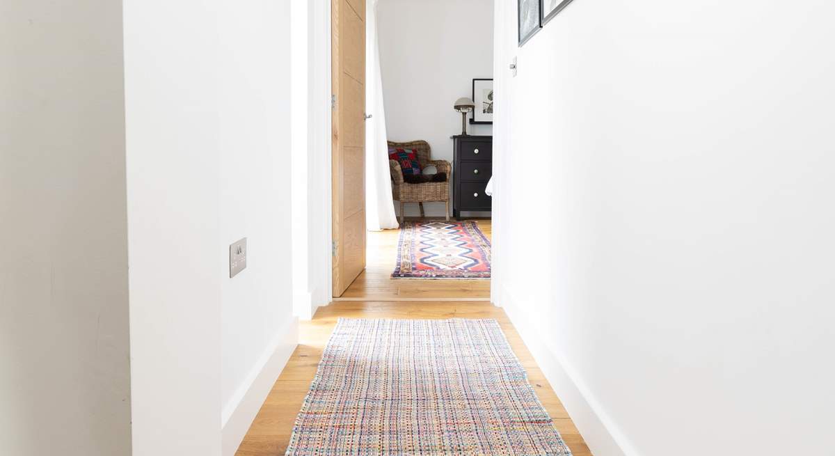 Three steps lead up to bedroom 4 from the living space. 