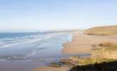 Two miles of golden sands of Perranporth are only a ten minute walk from your front door.  - Thumbnail Image