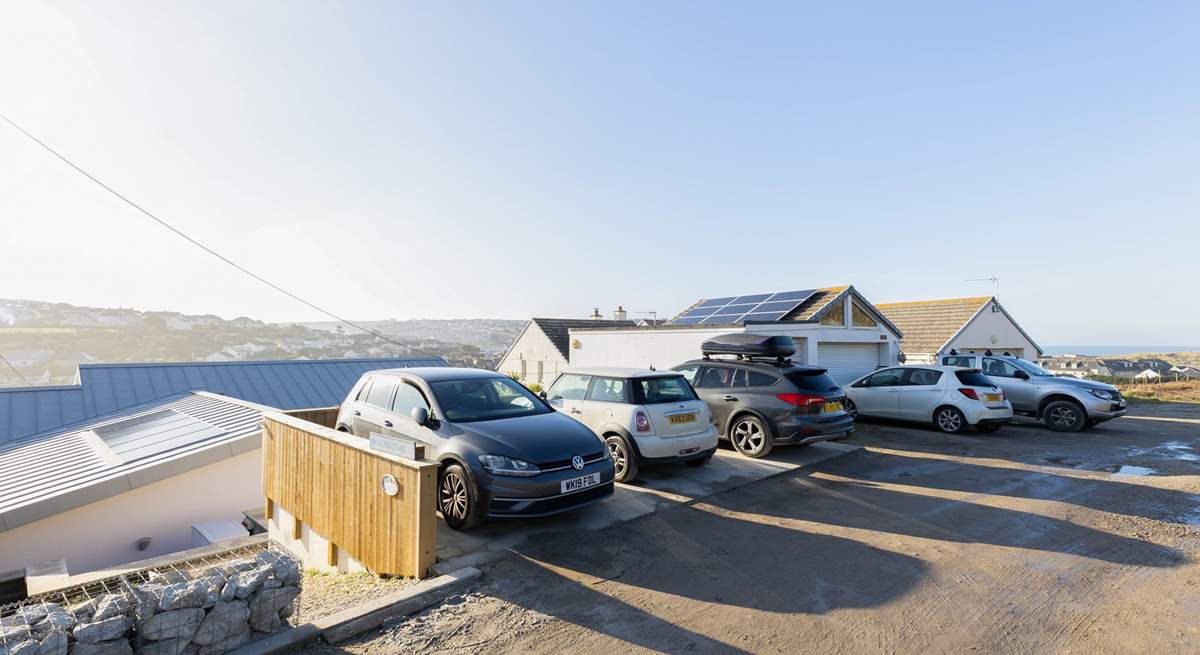 There is parking for three medium-sized or two large cars. 