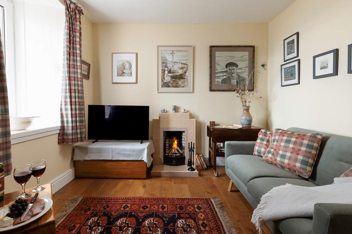 The open fire will keep you warm and cosy at any time of year.