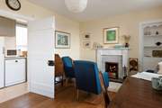 Sit awhile and put the world to rights with your feet toasting by the fireside.