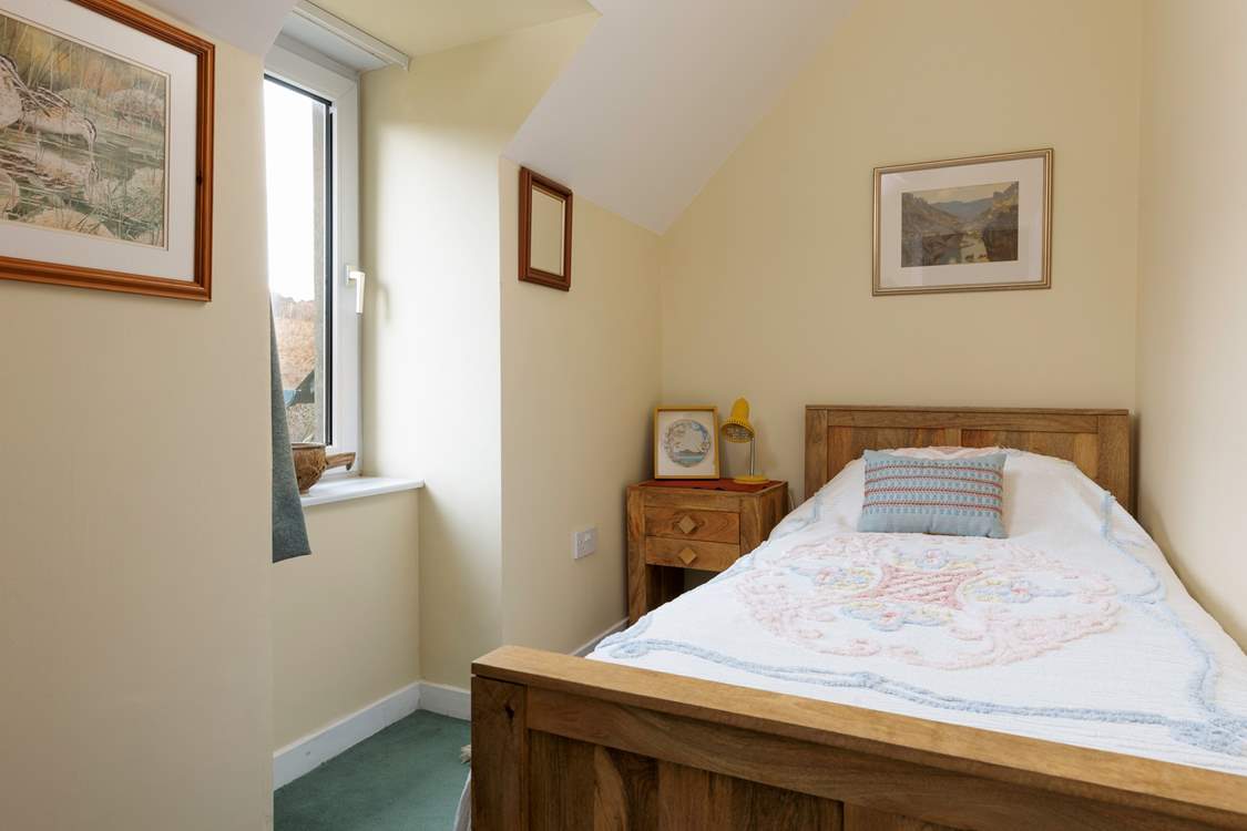 A cosy single looks out over the hills at the rear.