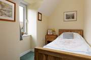 A cosy single looks out over the hills at the rear.