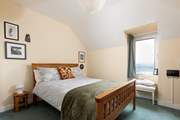 Cosy up in this lovely bedroom and take time to sit by the window and watch as the light changes over the day.