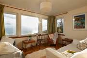 Relax and enjoy the view, maybe spotting the seals basking on the rocks or a golden eagle soaring overhead.