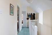 Light floods into the first floor landing.
