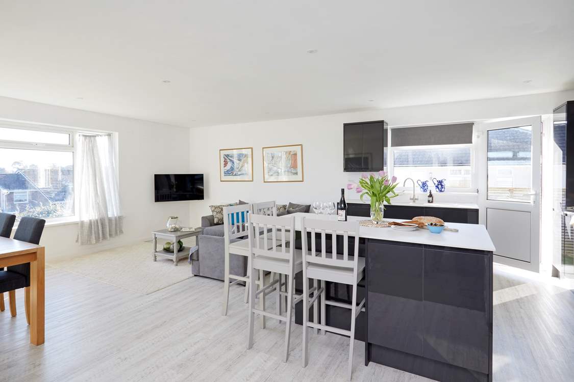 Perch at the breakfast-bar and chat with the chef.